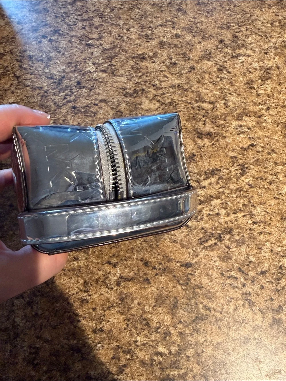 Michael Kors Metallic Silver MK Embossed Cosmetic Case